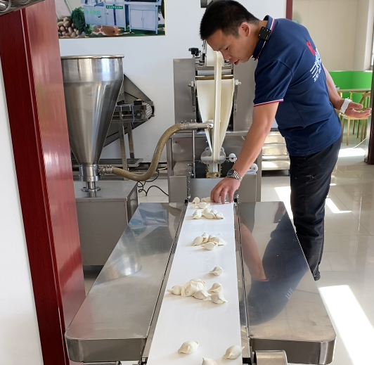 想做速凍餃子加工廠，應(yīng)該選用什么樣的餃子機(jī)？